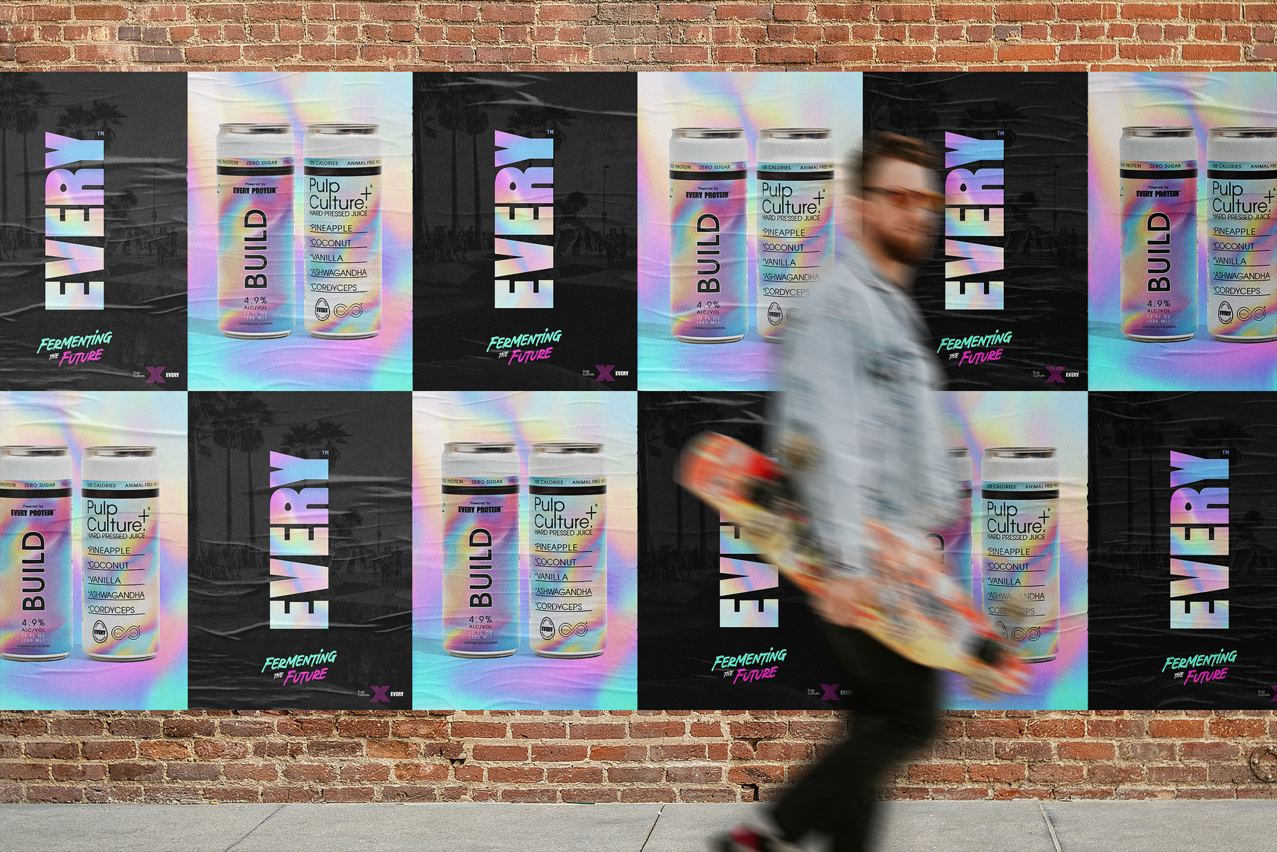 EVERY Advertisements on a brick wall as a person walks by