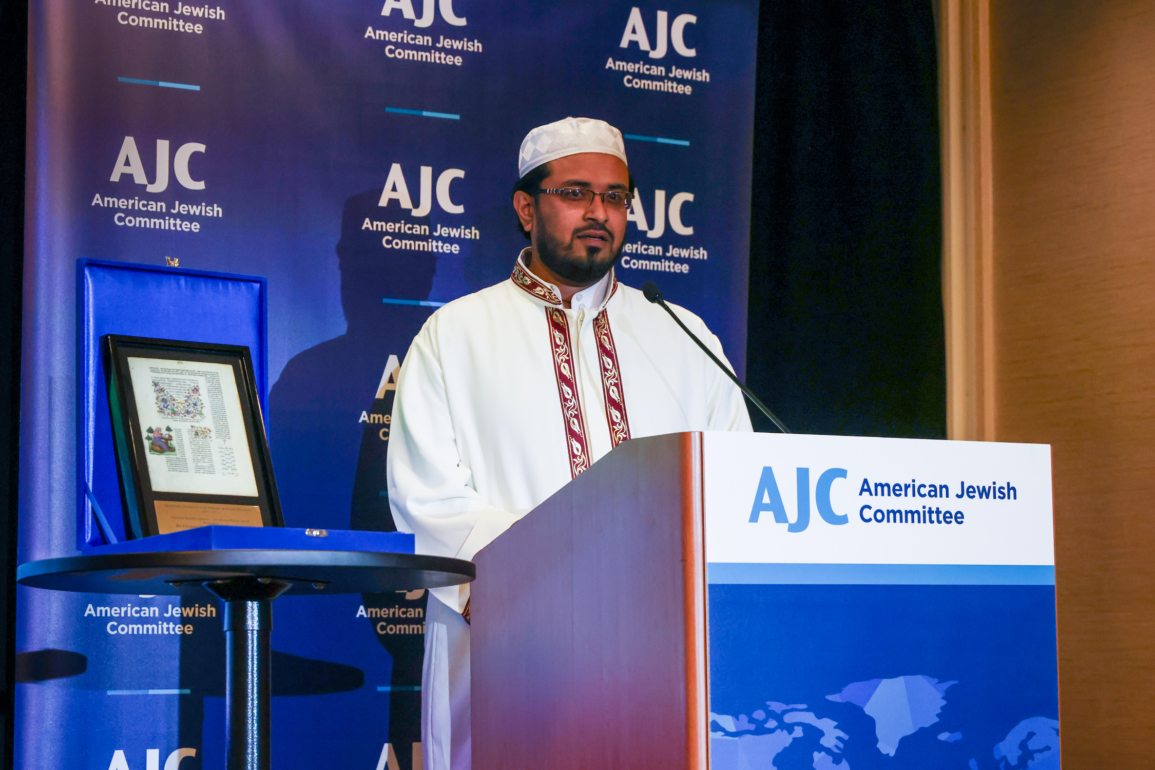 Imam Noor Ahmad offered prayers in Arabic. 