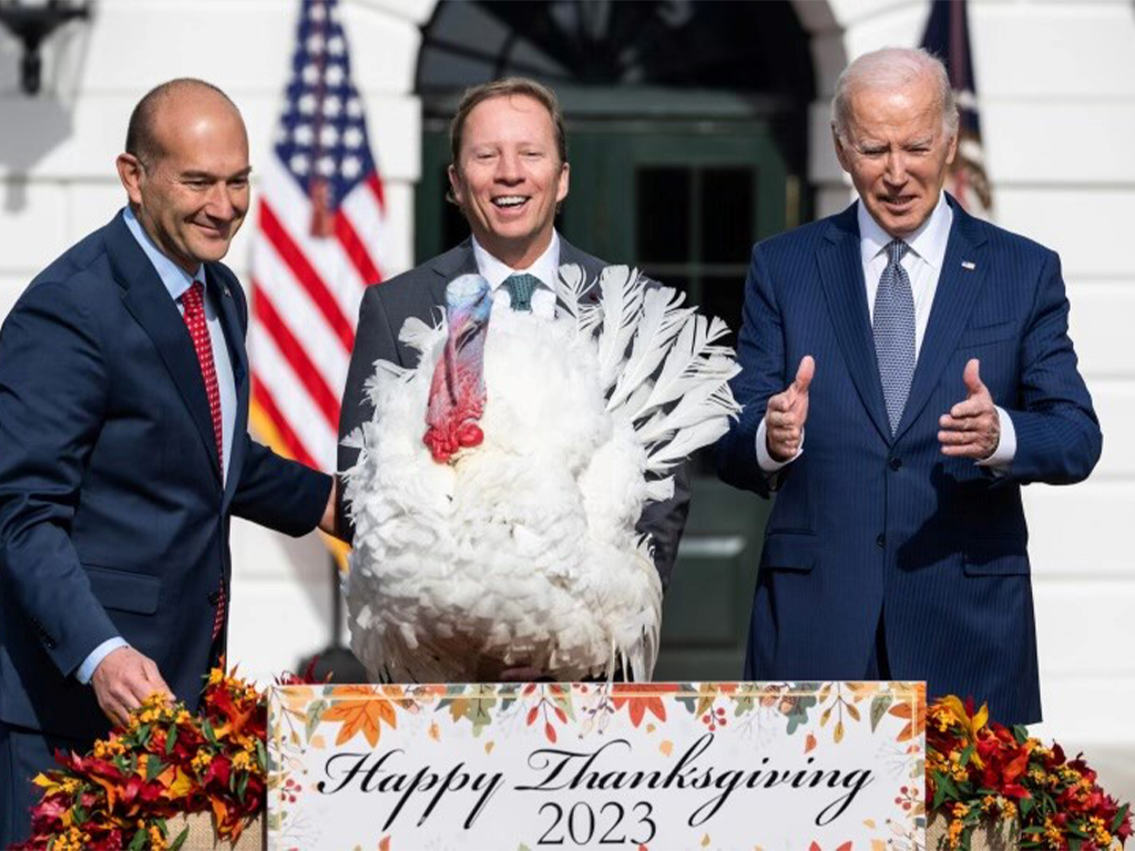 NTF Chairman Steve Lykken and Jose Rojas from Jennie-O Turkey Store with President Biden and Liberty at the 2023 National Thanksgiving Turkey Presentation at the White House