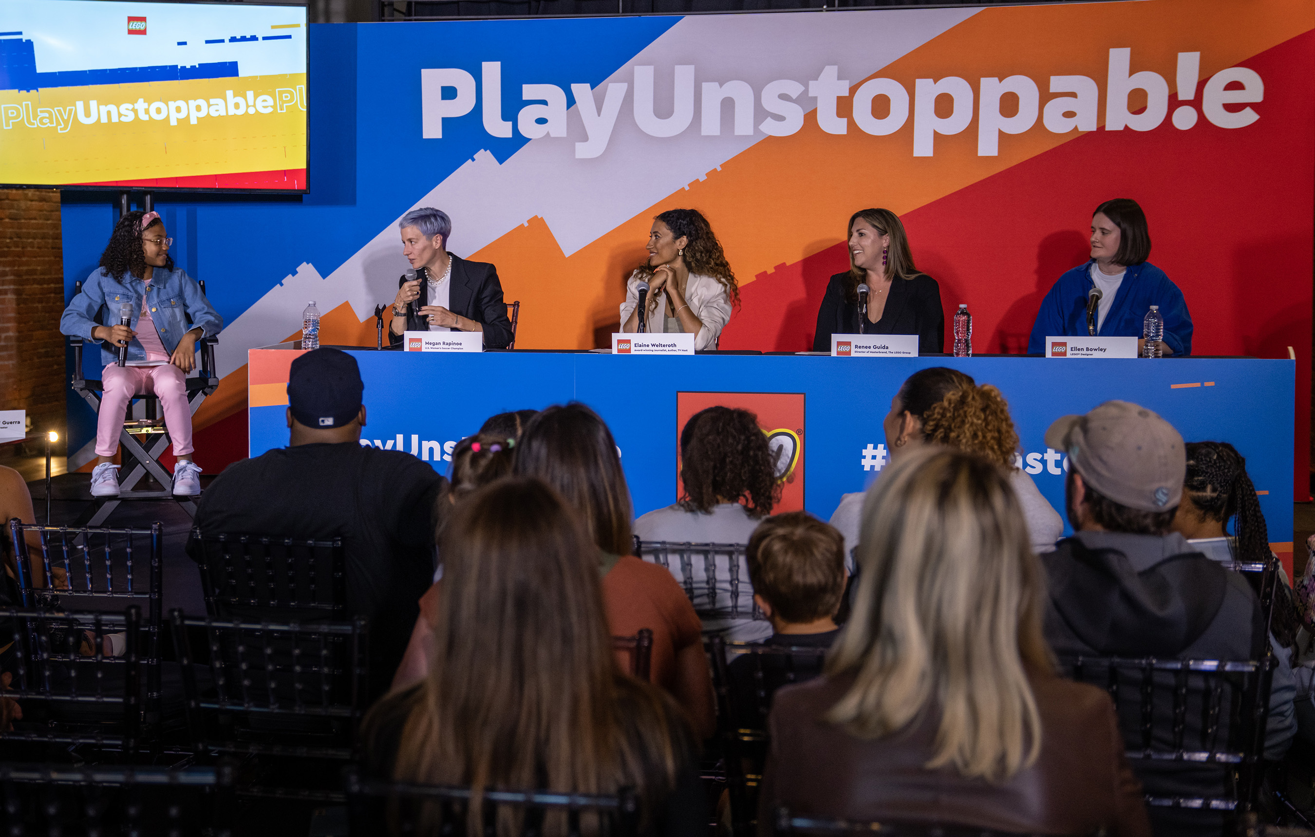 Kid reporter Jazlyn 'Jazzy' Guerra, far left, moderates a panel with the LEGO Group's Team Unstoppable co-captains Megan Rapinoe, second from left, and Elaine Welteroth, center, Americas director of Masterbrand at the LEGO Group, Renee Guida, second from right, and LEGO Friends designer Ellen Bowley during the LEGO Group’s Play Unstoppable press conference on Friday, June 2, 2023 in Seattle (Stephen Brashear/AP Images for The LEGO Group)