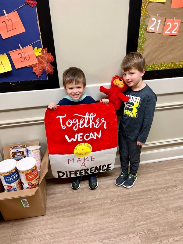 Students from Primrose School at Oregon Park (Marietta,GA) gather canned items to donate to underserved children and families in their community.