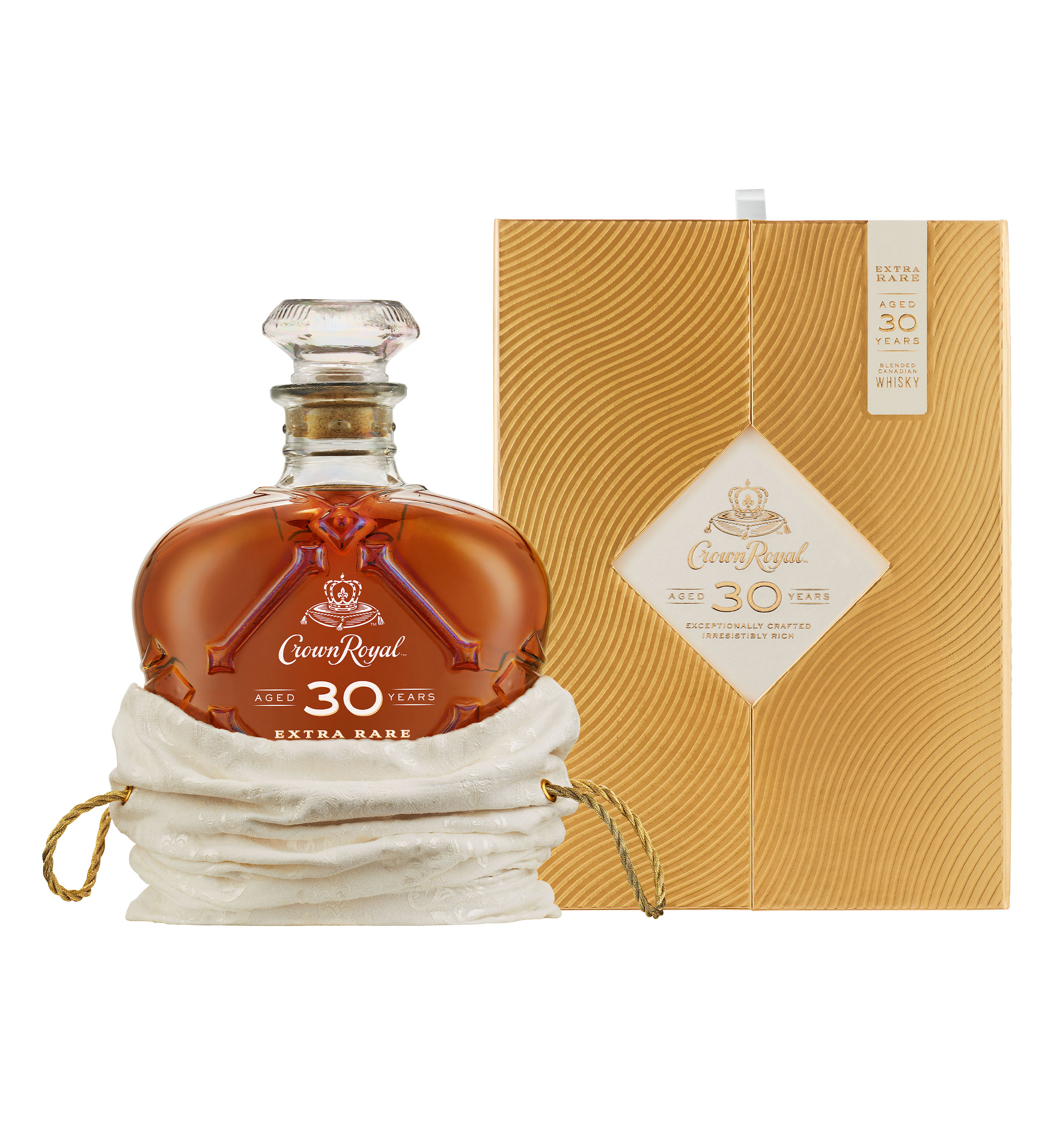 Crown Royal Aged 30 Years in its luxurious cream-colored, iconic Crown Royal bag with golden collector’s box.