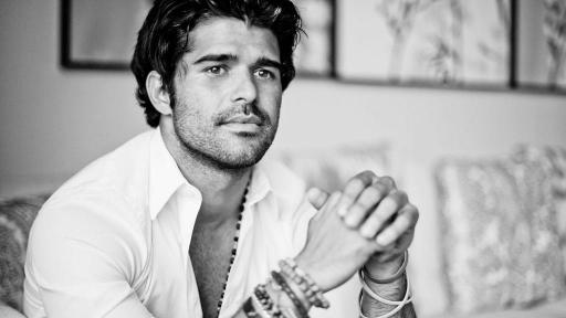 Black and white portrait of Alexander Mijares