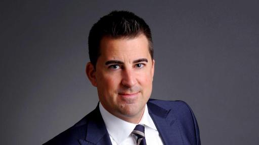 image of Richard Lajoie wearing a business suit