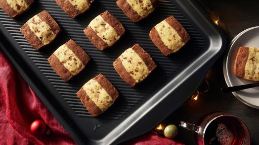 Made from heavy gauge carbon steel, these baking sheets are designed with a textured surface that increases airflow. This ensures heat is transferred evenly and helps avoid soggy or stuck-on foods so you get delicious results. At 0.8 mm thick, they’ll withstand heat without warping in the oven – the perfect addition or upgrade for your bakeware collection.