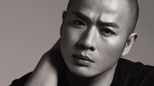 A black and white photo of a man