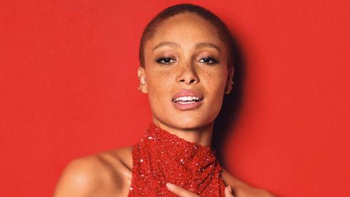 Model, Adwoa Aboah, in a red dress
