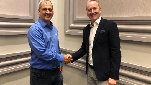 (Left to right) InspectionXpert Founder and CEO, Jeff Cope, and Ideagen CEO, Ben Dorks, celebrate Ideagen&rsquo;s acquisition of InspectionXpert