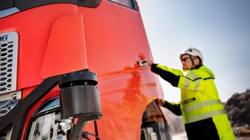 Image of worker getting in to a truck - Testing is currently underway and the solution is expected to be fully operational by the end of 2019. During the testing phases a safety driver sits in the cab, but in real operation the trucks are completely autonomous.