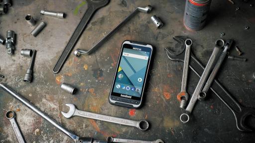 Image of Nautiz X6 ultra-rugged phablet on the ground around tools. The Nautiz X6 ultra-rugged phablet has the large-screen functionality of a tablet, with the work-anywhere ruggedness of a handheld.