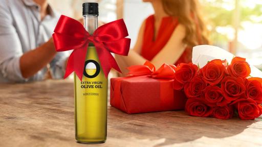 Image of couple with Olive Oil from Spain on the table