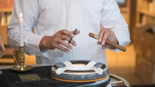 Image of Cutting of Habano cigar.