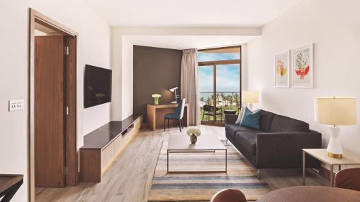 A contemporary and chic living space with panoramic views of the Arabian Sea