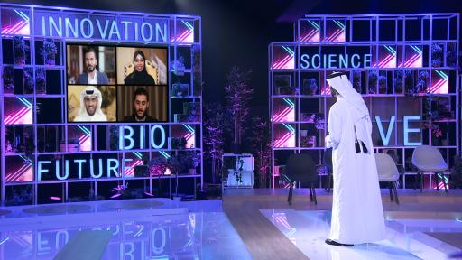 Man talking to people on screens