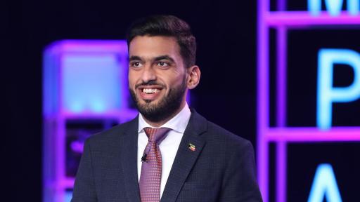 Man standing and smiling