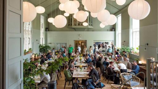 Image of The dining area inside the Refettorio Felix in London
(Credits: Tom Mannion)