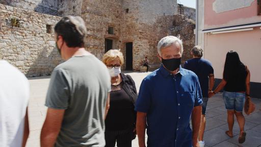 Image of people walking around