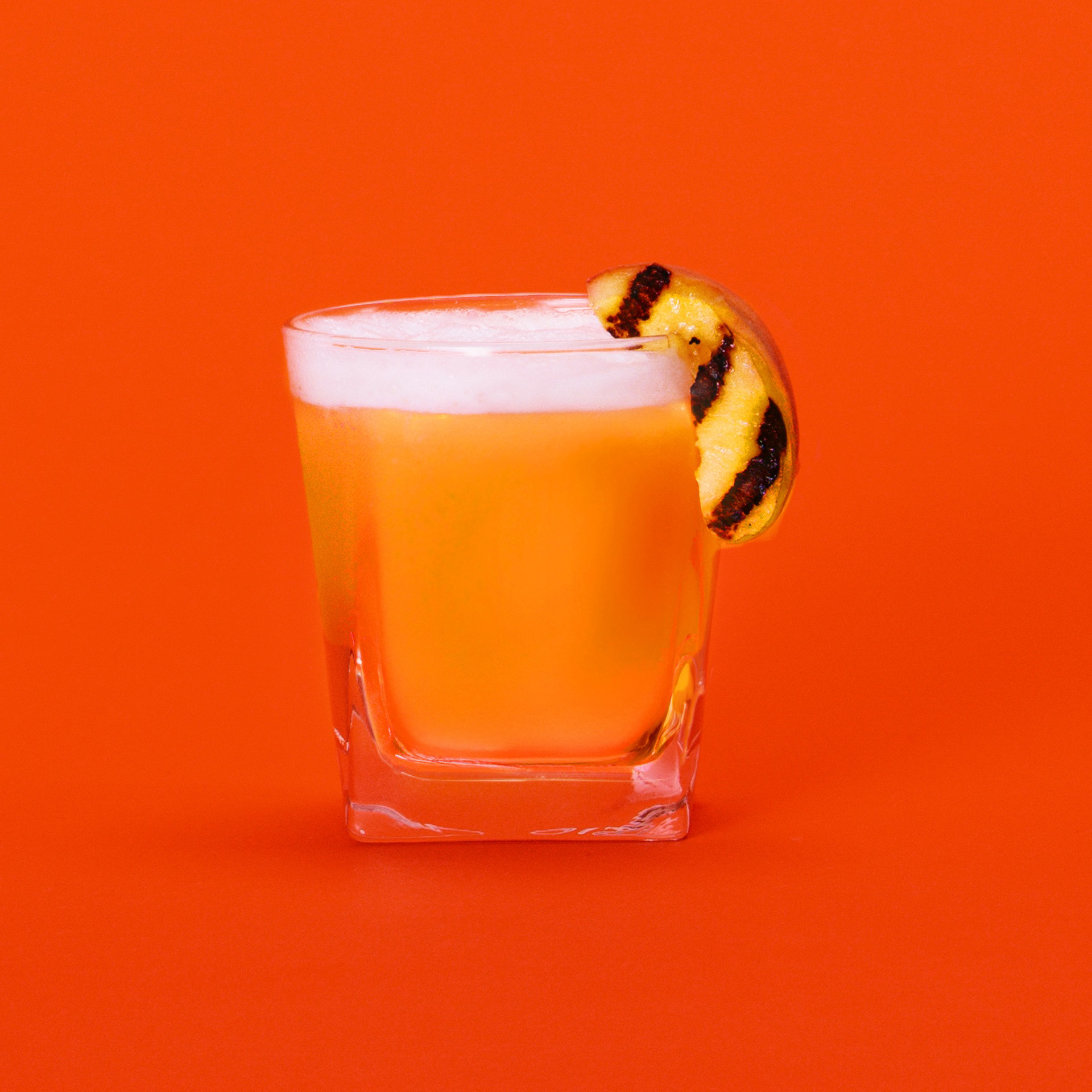 Peach Sour with Bulleit Bourbon Mesquite Smoked Malt Kentucky Straight Bourbon Whiskey