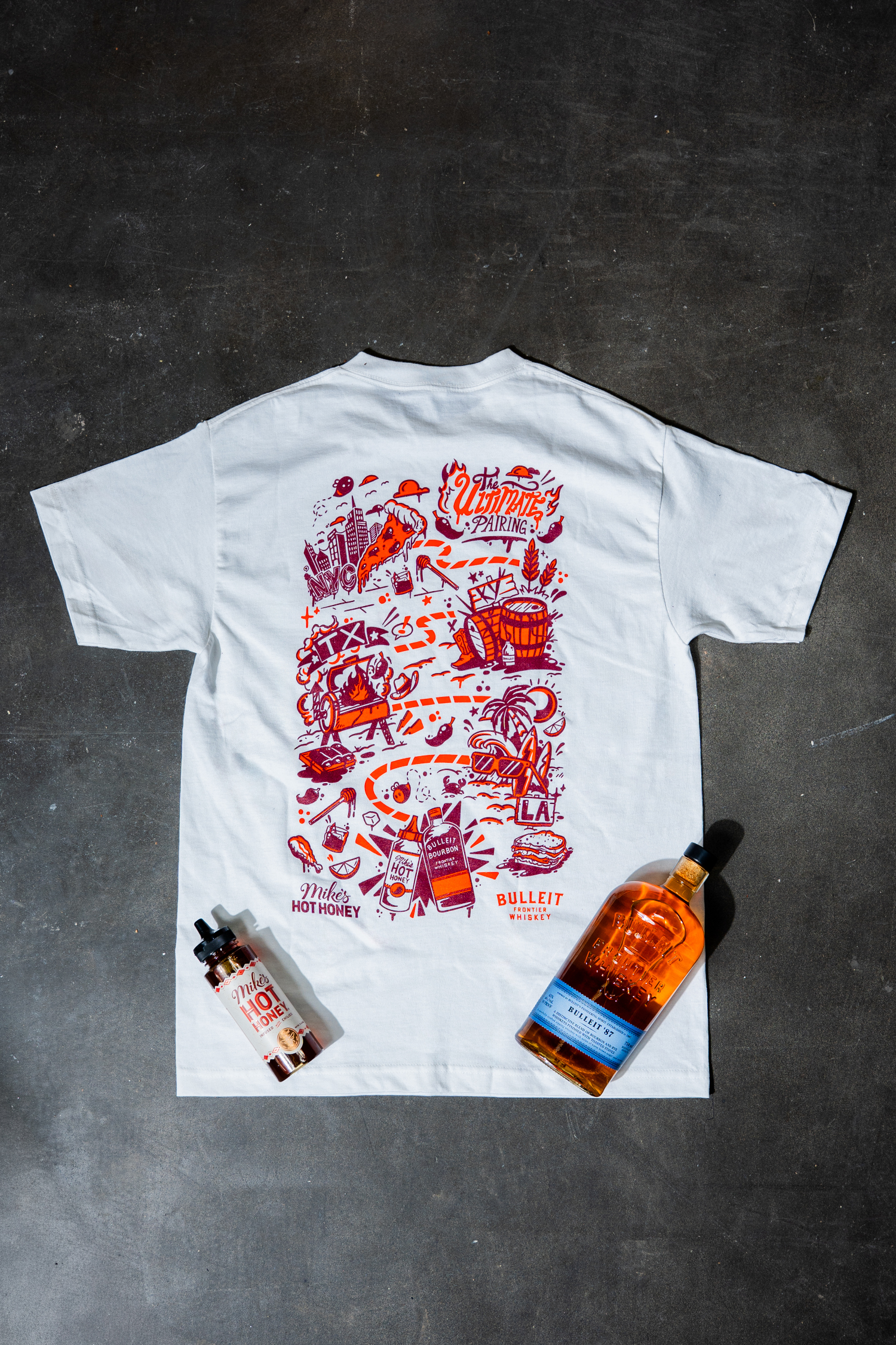 Custom Bulleit Frontier Whiskey x Mike's Hot Honey tee-shirt, illustrated by Diego Aguilar and available on the Mike's Hot Honey website while supplies last