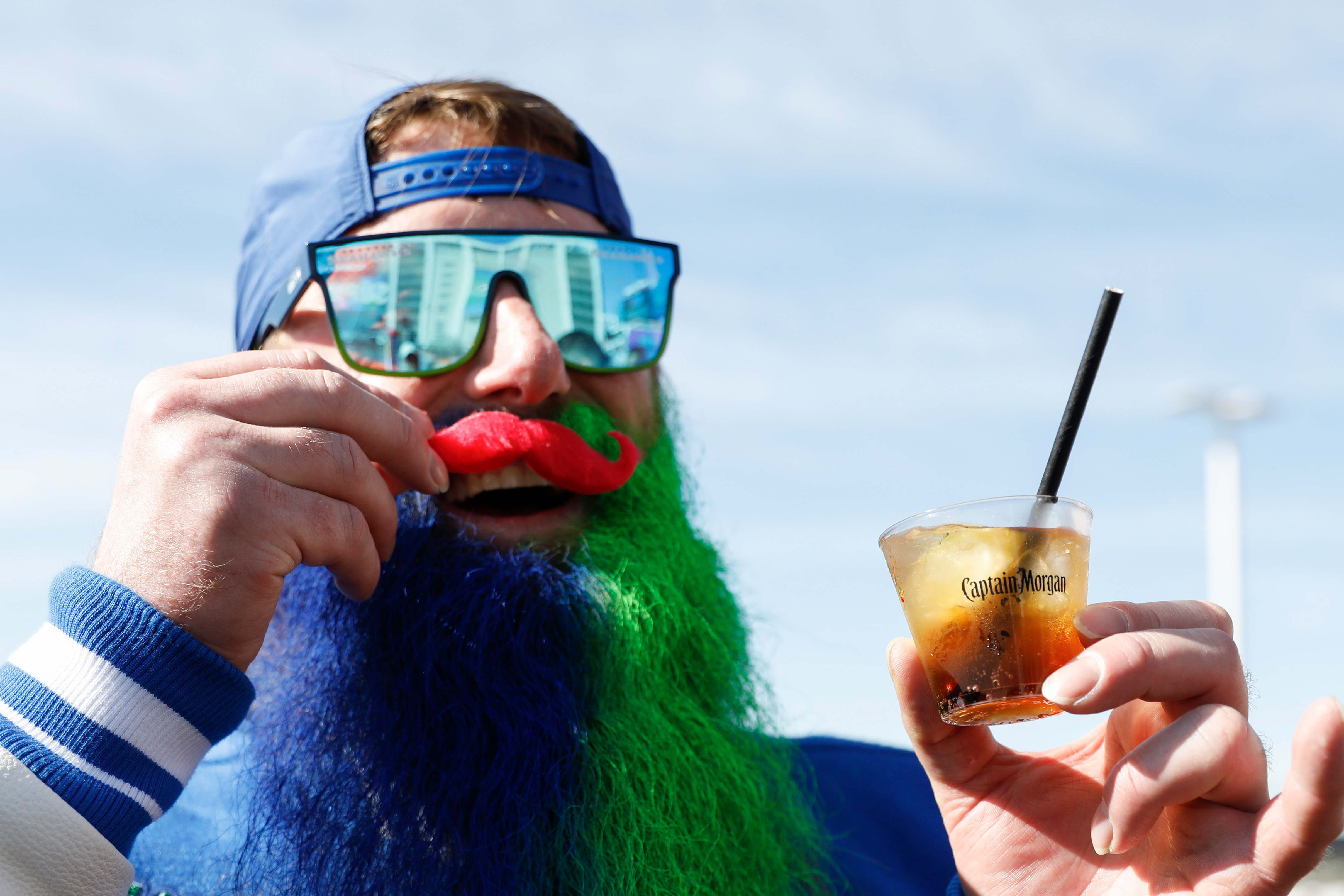 Captain Morgan, the Official Spiced Rum of SBLX, celebrates with fans at NFL Gameday Experience