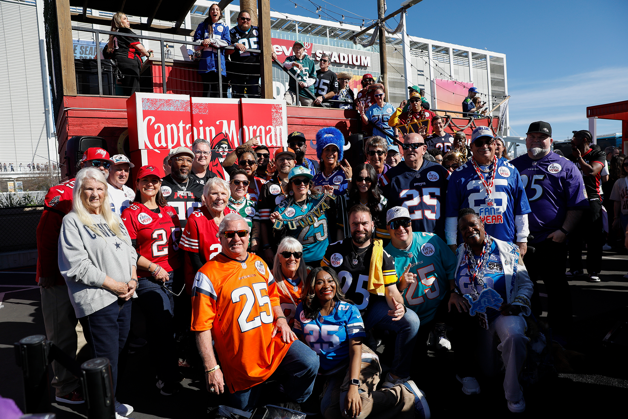 Captain Morgan, the Official Spiced Rum of SBLX, celebrates with the 2025 NFL Fan of the Year winners at NFL Gameday Experience