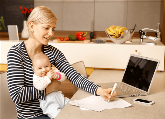woman with baby at desk