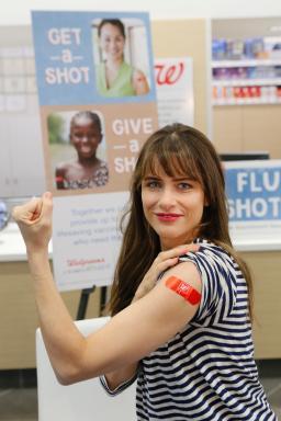Amanda Peet, Ambassador of Shot@Life poses after receiving her flu shot at Walgreens