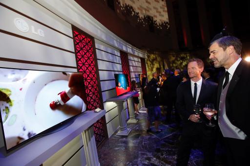 LG Art of the Pixel ambassador Neil Patrick Harris checks out art with LG’s Dave Vanderwaal in NYC