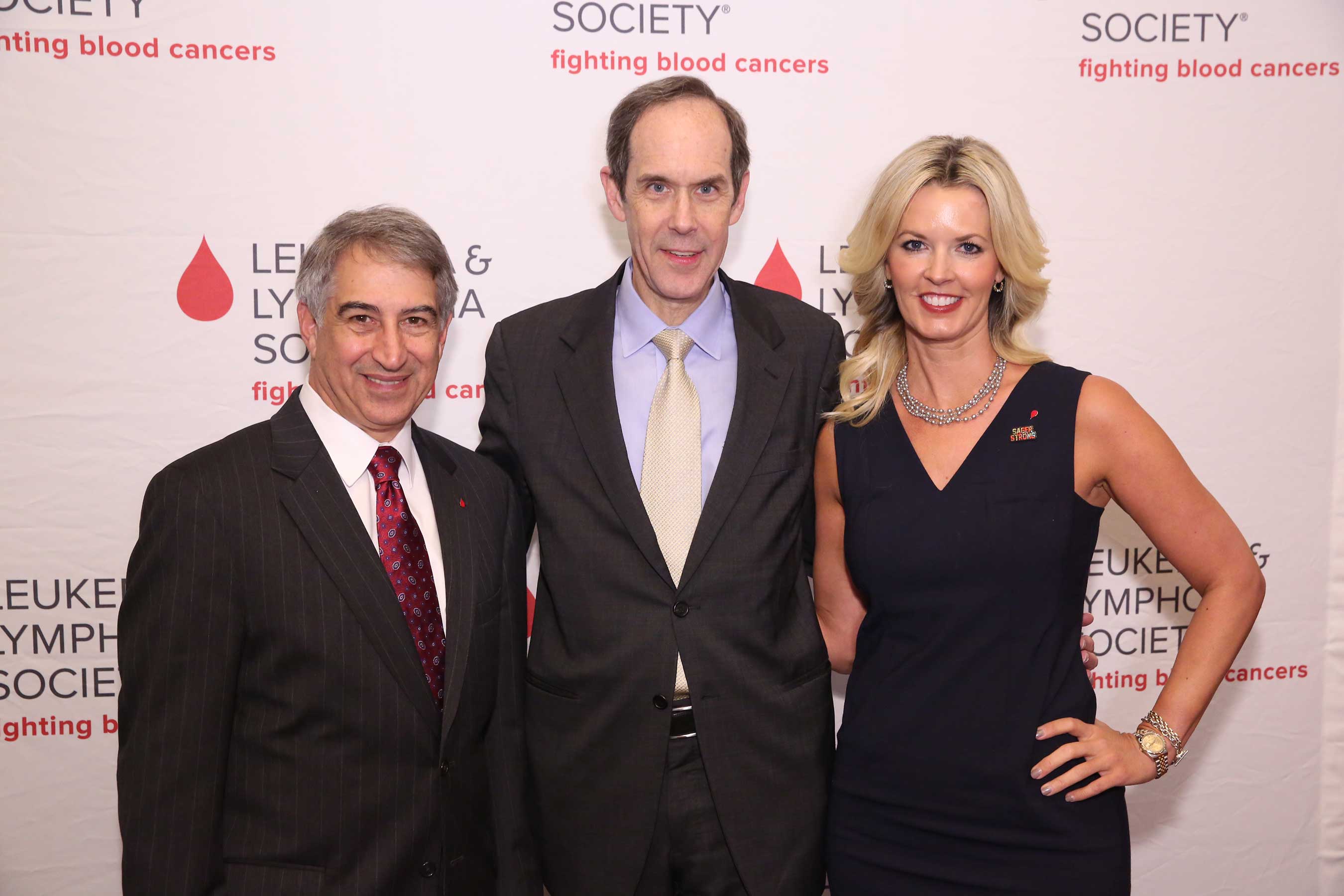 Dr. Louis DeGennaro, President & CEO, The Leukemia & Lymphoma Society; Dr. Brian Druker, Oregon Health & Science University, and Stacy Sager, president of SAGERSTRONG Foundation and widow of Craig Sager.