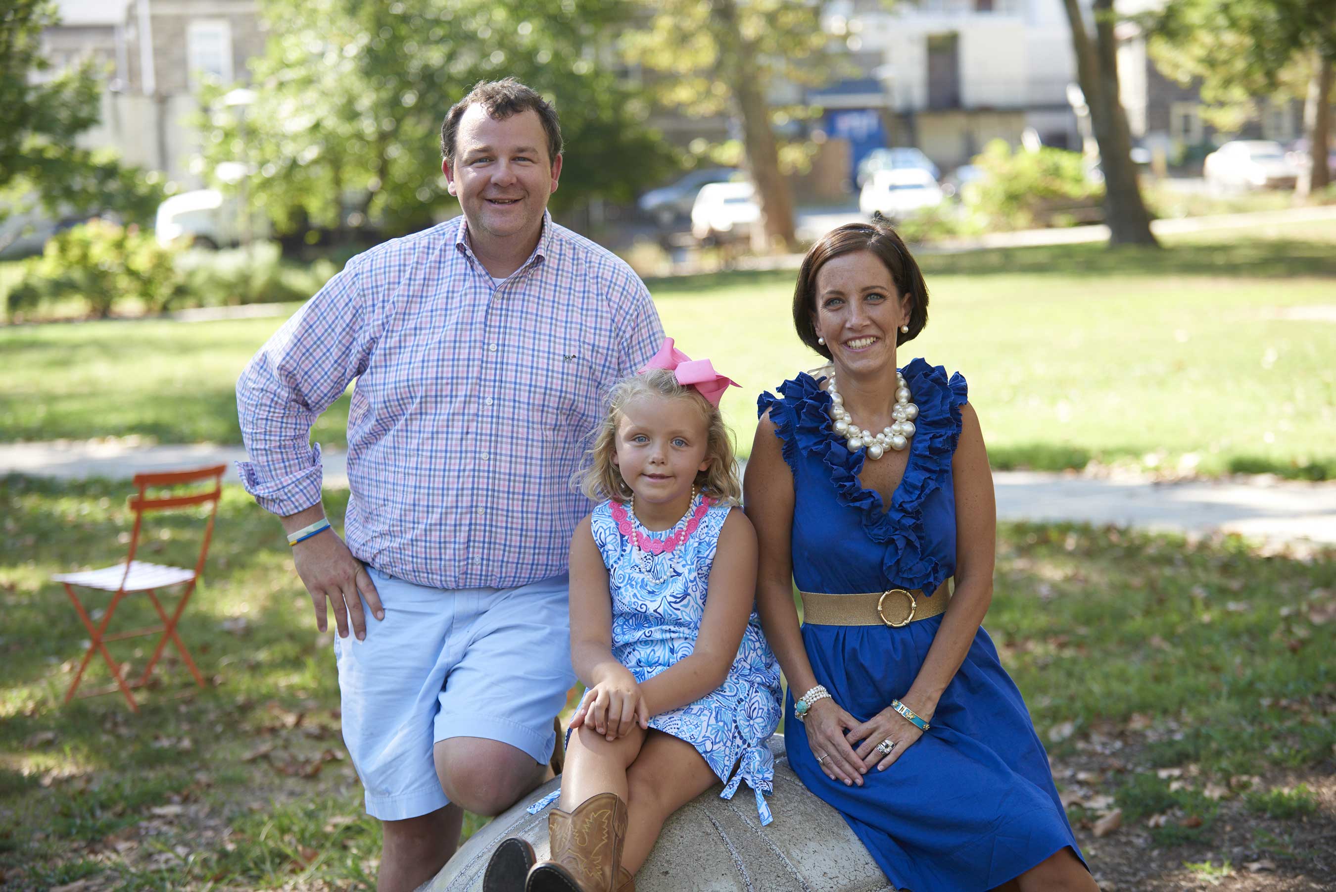 Edie Gilger, 7, poses with her parents, Nick and Emily Gilger. Edie and Emily fought cancer diagnoses together, and the family will ride on Northwestern Mutual’s Rose Parade® float to raise awareness for childhood cancer.