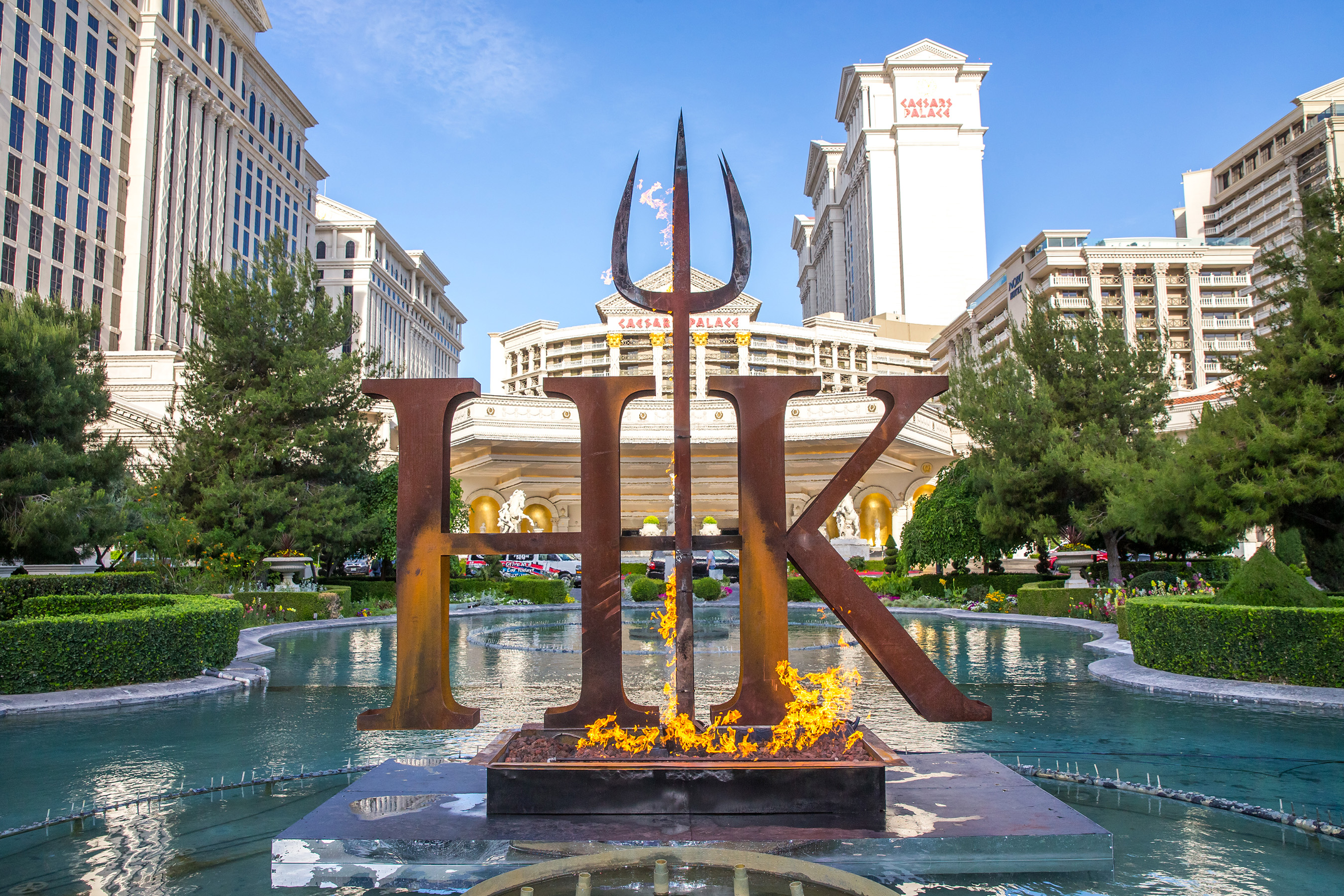 The series' signature pitchfork ignited in the iconic Caesars Palace fountains, heralding the arrival of Gordon Ramsay Hell's Kitchen restaurant