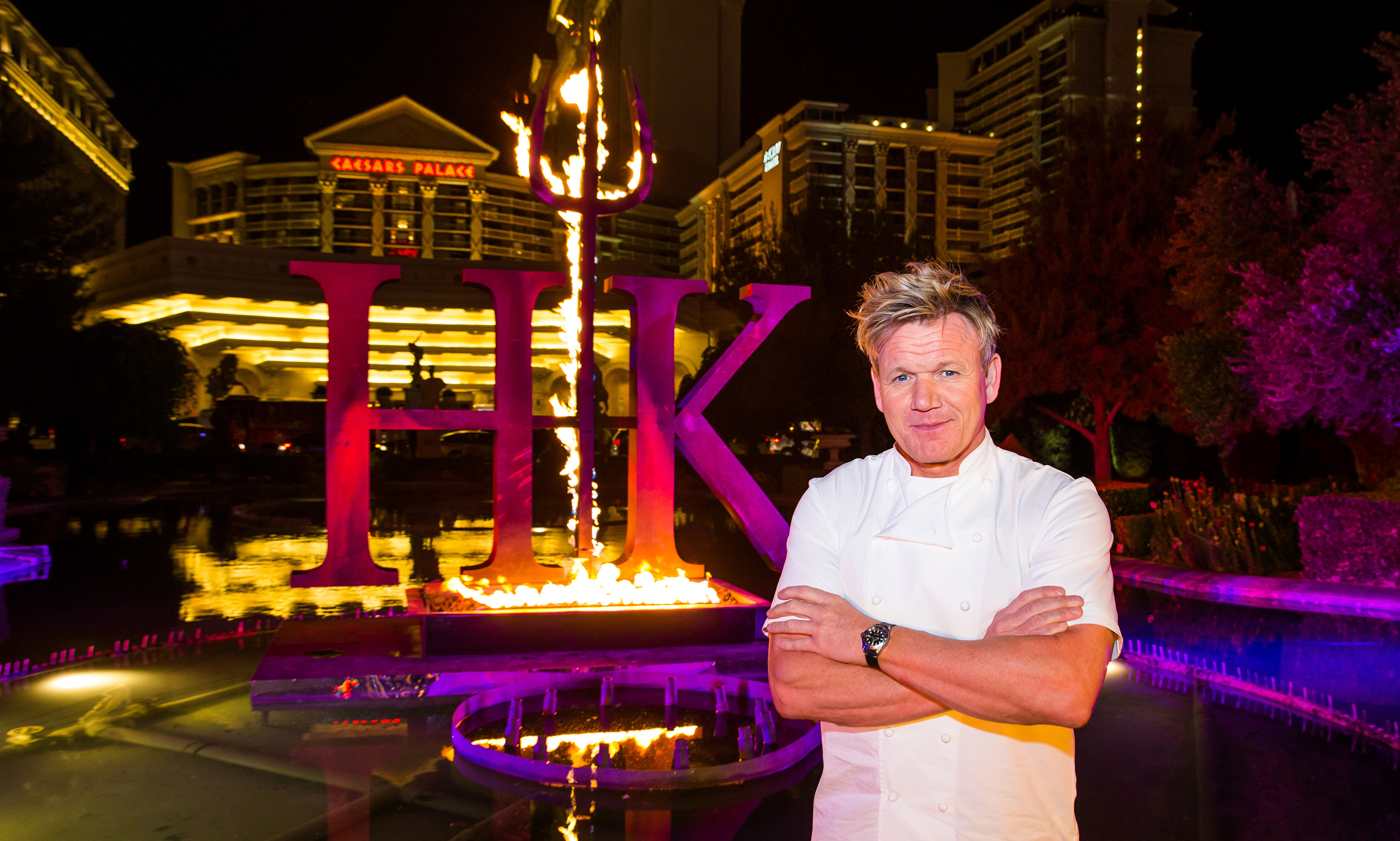 Chef Gordon Ramsay poses with series’ signature pitchfork in front of the iconic fountains at Caesars Palace Las Vegas announcing the upcoming winter debut of Gordon Ramsay Hell’s Kitchen restaurant.