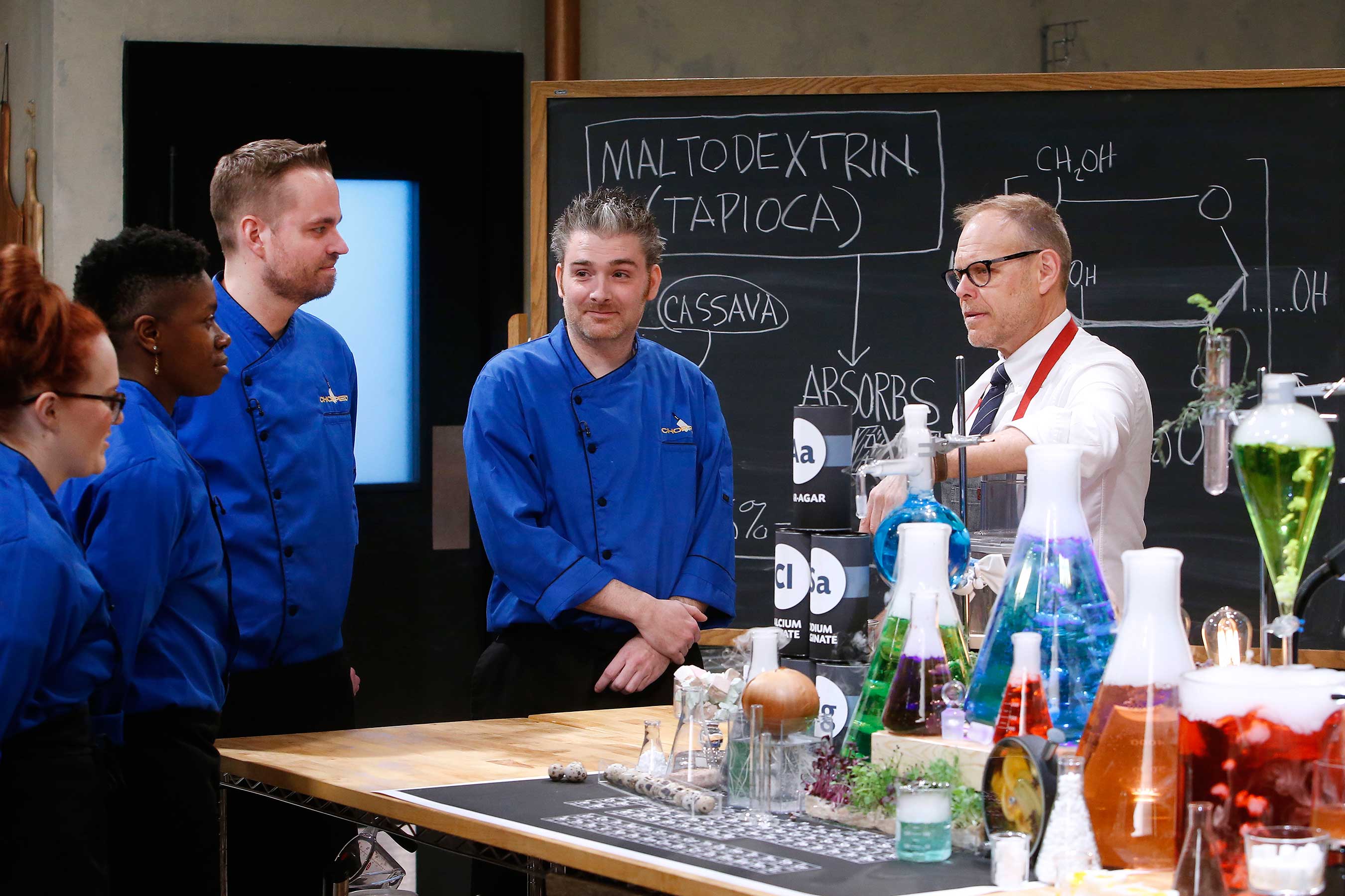Alton Brown gives the chefs a demonstration