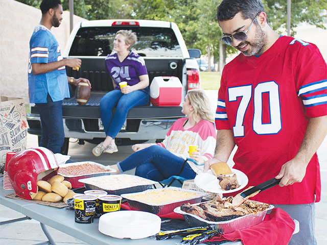 Impress your tailgate guests with delicious slow-smoked barbecue, savory sides and buttery rolls.