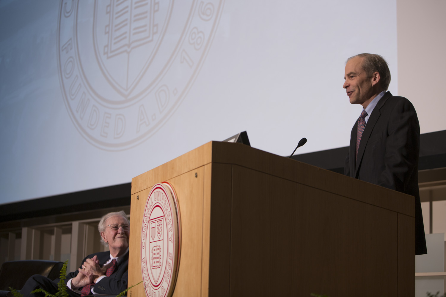 Fisk Johnson addresses students, faculty, alumni and administration at Cornell University today. left to right: Frank H.T. Rhodes, President Emeritus, Cornell University and Fisk Johnson.
