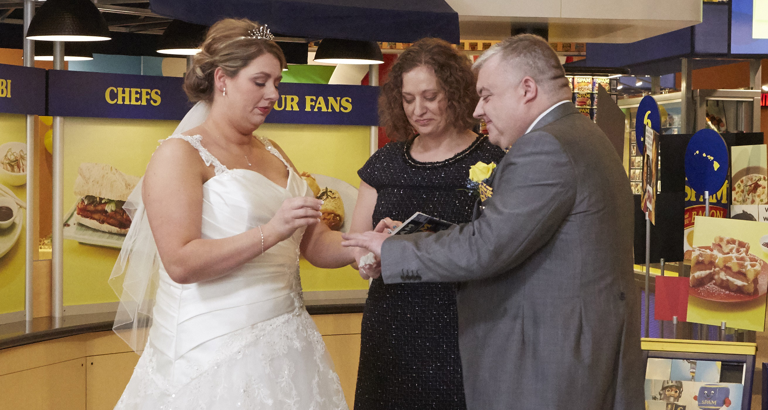 Mark I Love SPAM Benson and Anne Mousley exchanging vows at the SPAM Museum