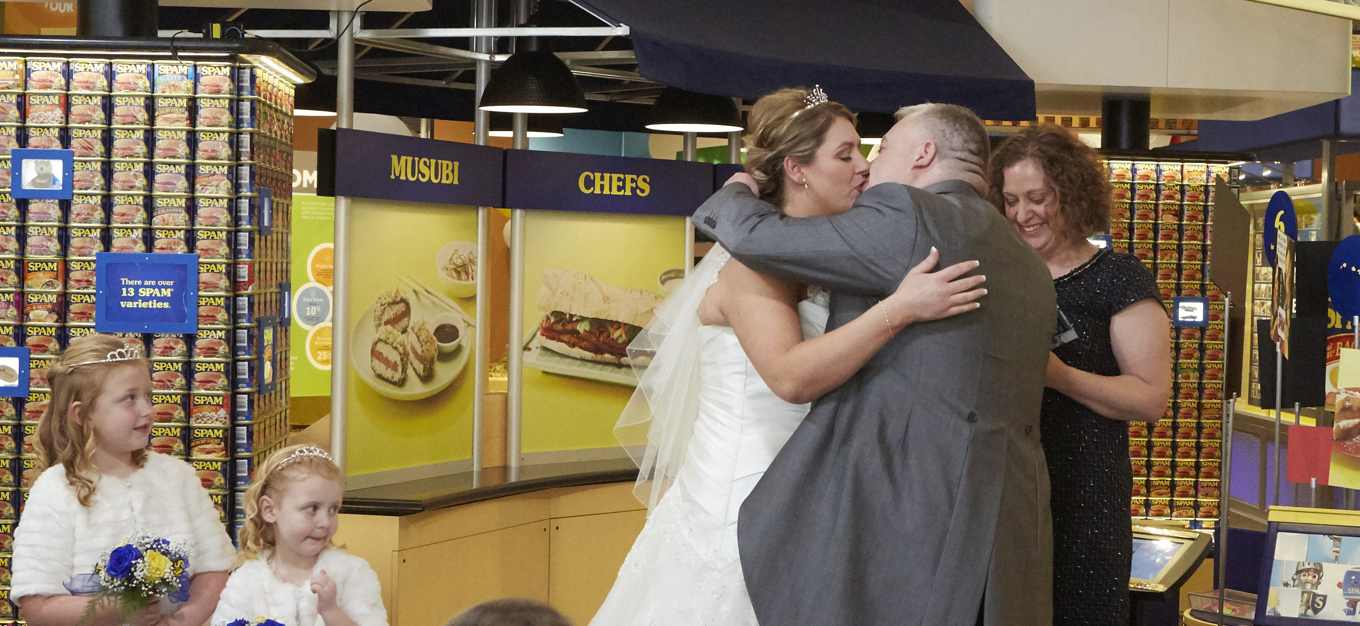 Mark I Love SPAM Benson kisses his bride Anne during the first wedding ceremony to take place at the SPAM Museum in Austin, MN