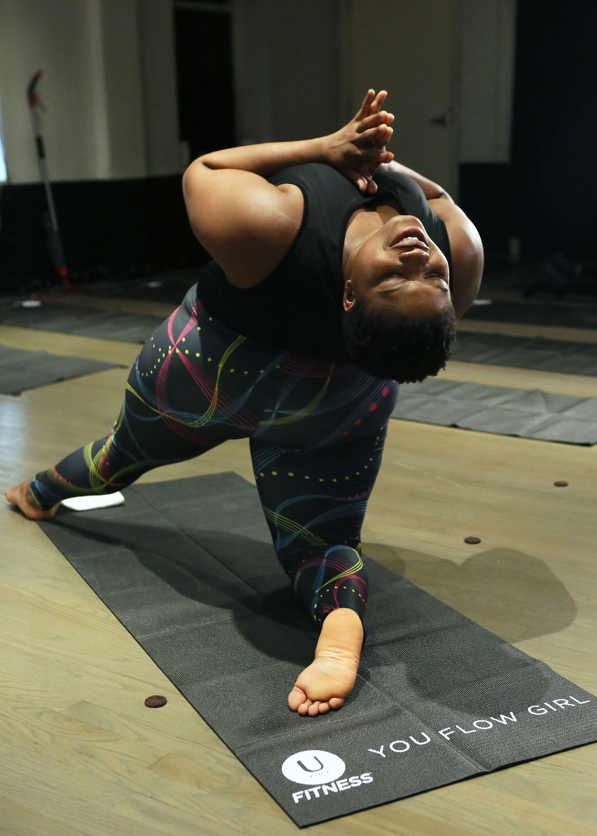 Yoga teacher and body positivity advocate Jessamyn Stanley hosts a private class in New York City to celebrate the launch of the NEW U by Kotex® FITNESS* line on Thursday, April 27, 2017. (Stuart Ramson/AP Images for U by Kotex® FITNESS)
