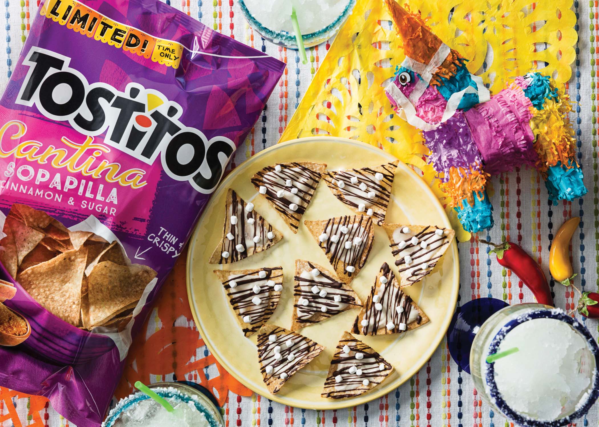 Featuring limited-time only Tostitos Cantina Sopapilla Cinnamon & Sugar tortilla chips, this recipe for Mexican Hot Chocolate Chips will make your party end on a sweet note.