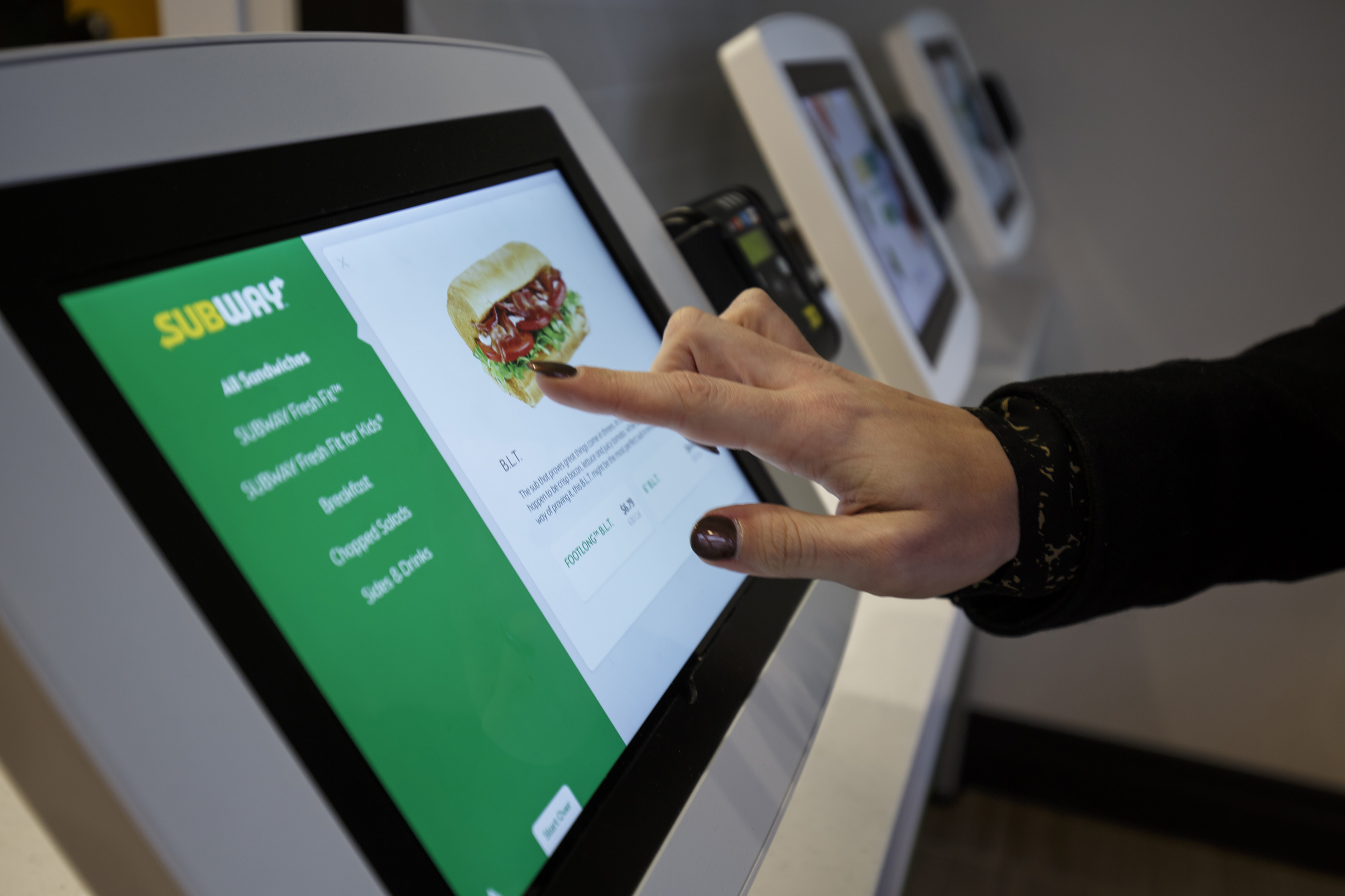Self-order kiosks in select locations provide customers with ordering flexibility.