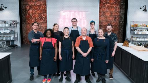Contestants of Food Network's Best Baker in America standing in kitchen