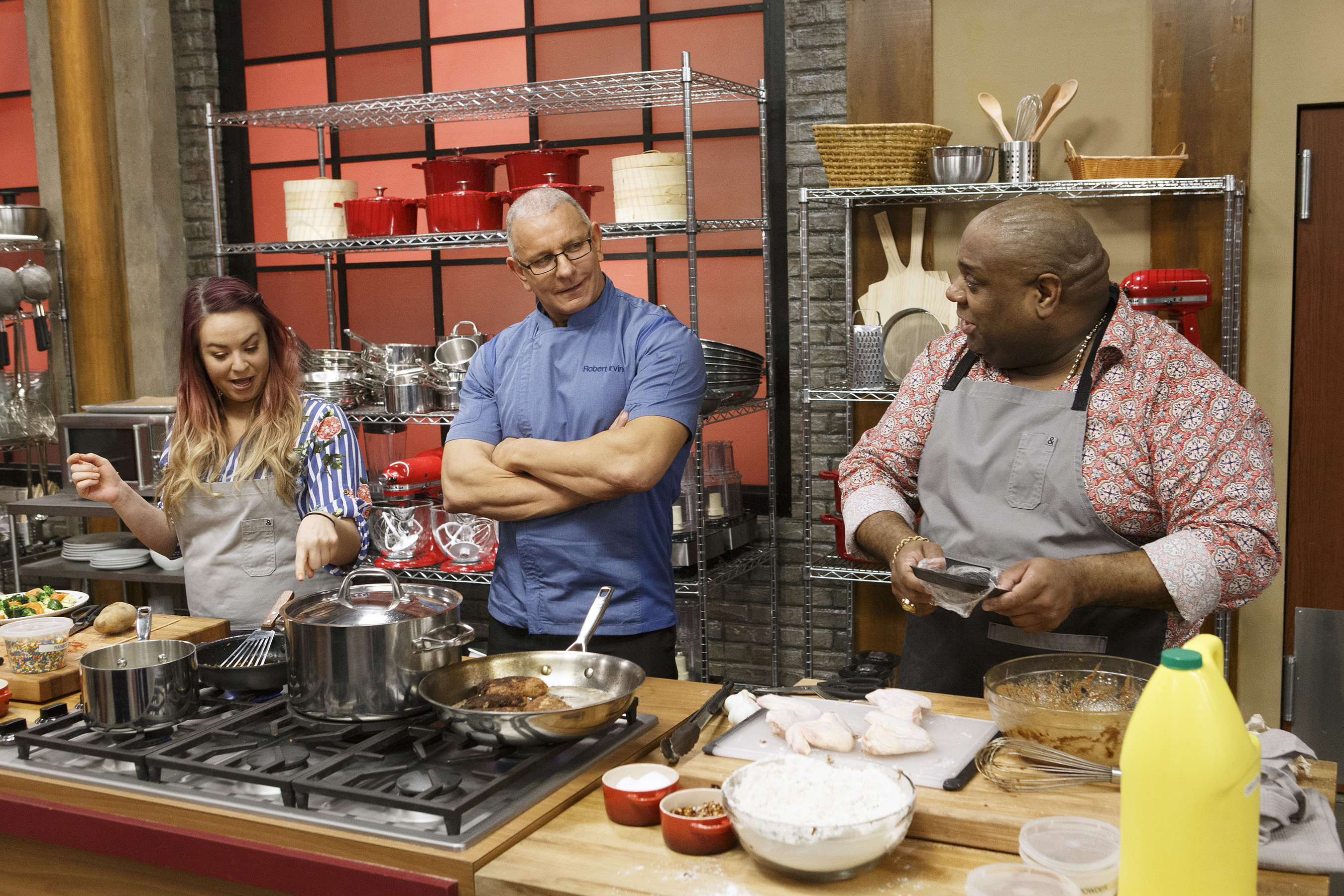 Robert Irvine checks in on recruits Jessica Paulson and Marcus Ellis on Food Network's Worst Cooks in America