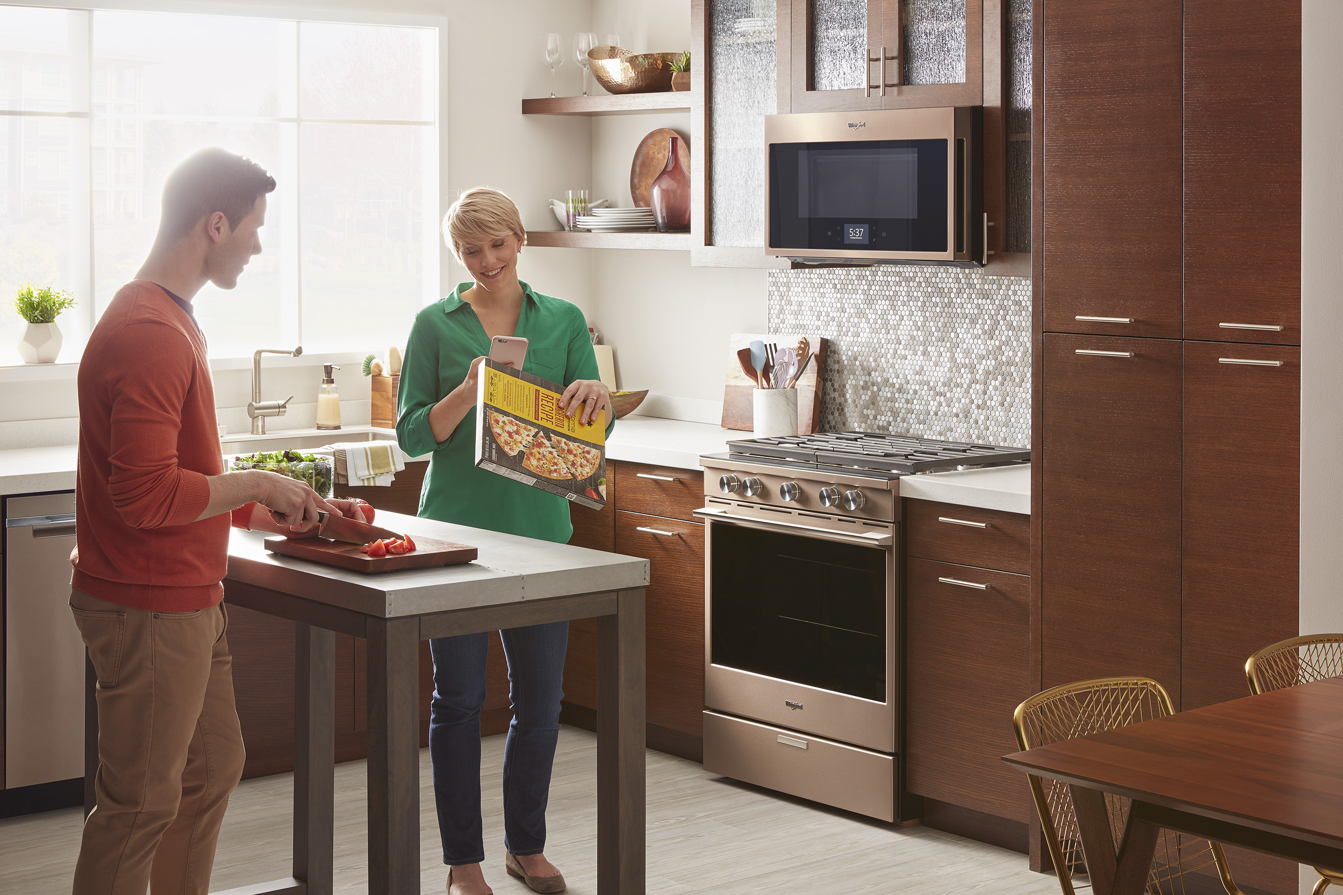 The Whirlpool® Smart Front Control Range, in Sunset Bronze finish, works with Yummly to help cut out routine steps to get dinner on the table quickly and make mealtime easier, better and faster.