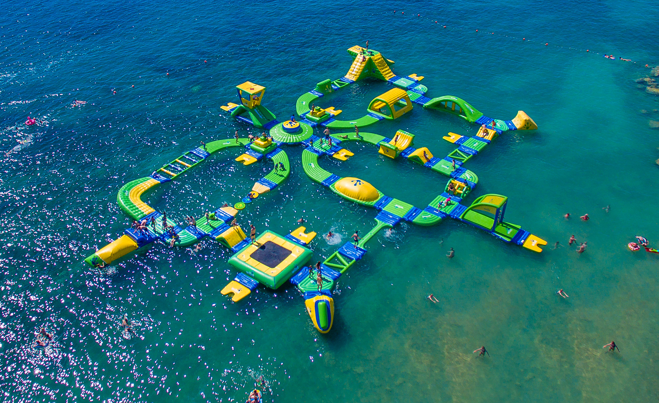 Nona Adventure Park will feature an inflatable, floating obstacle course, a 60-foot climbing tower and other thrills.