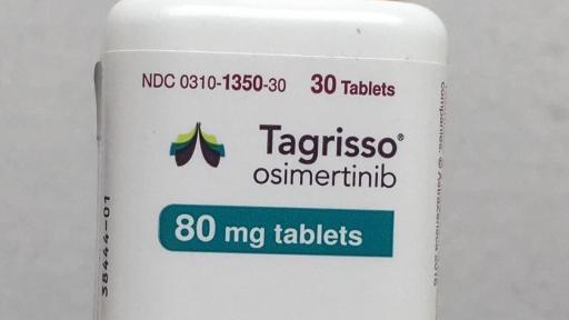 White plastic pill bottle for Tagrisso.