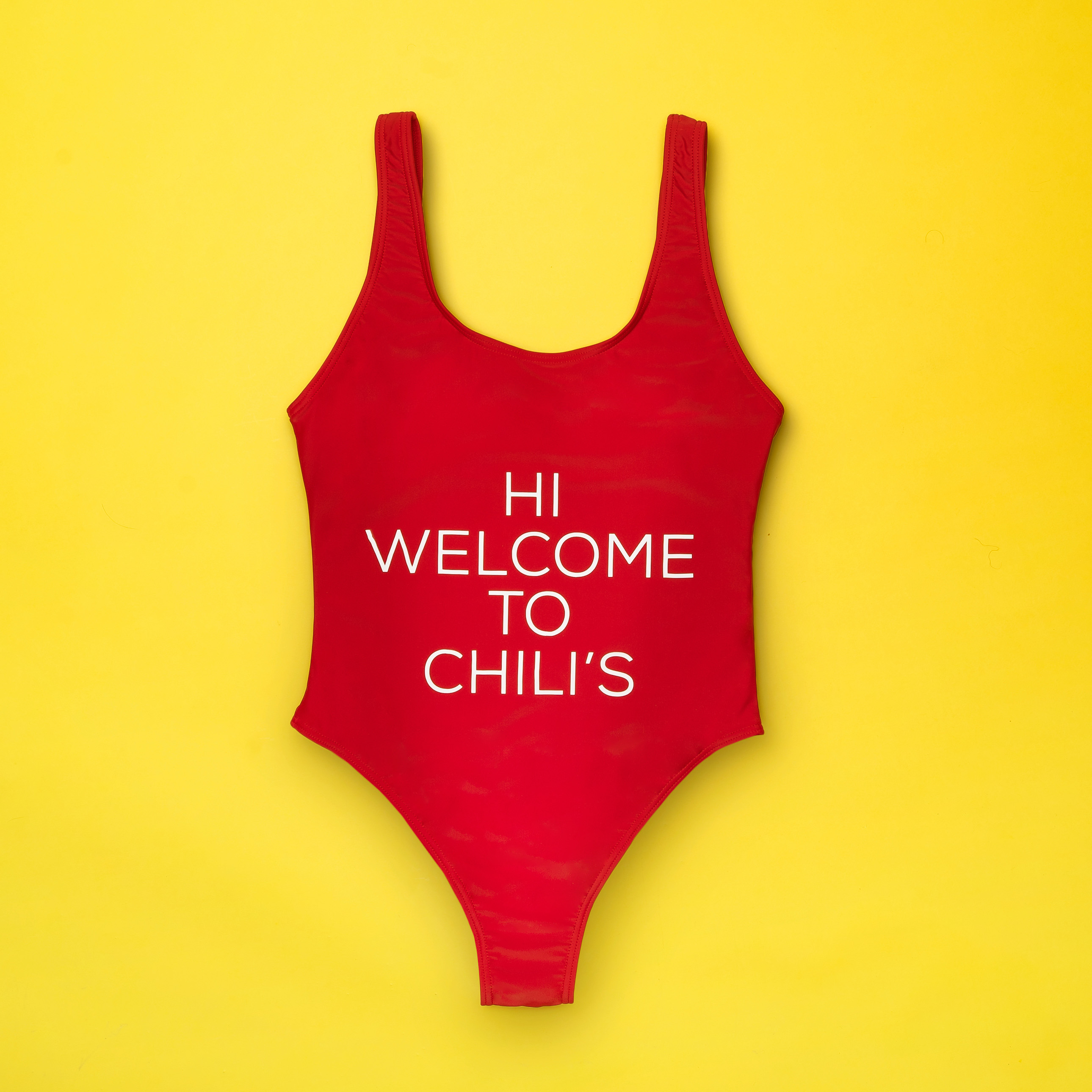Just add water (or not) with this fashionable one-piece show-stopper that combines that classical causal Chili’s vibe with holes for your arms, legs, and head.