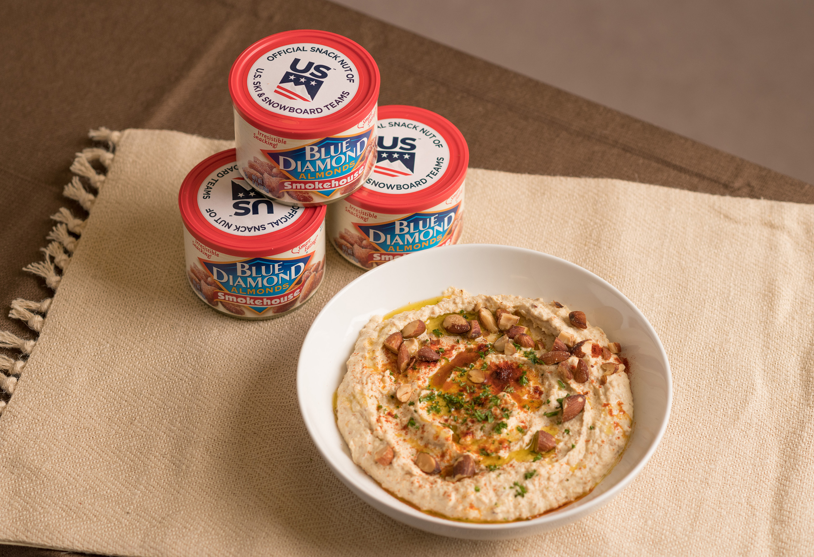 The Smokehouse Almond Hummus gets its bold, smoky flavor from Blue Diamond Smokehouse almonds - a perfect match for the bold athletes.