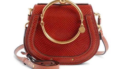 Red purse with gold accents