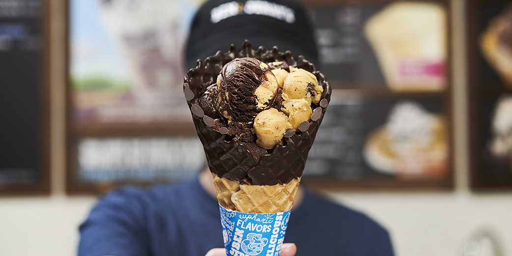 Try two scoops of your favorite flavor in a chocolate-dipped waffle cone, topped with edible cookie dough.