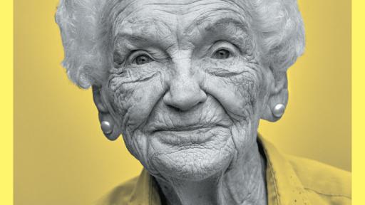 Lola, an elderly woman, smiling